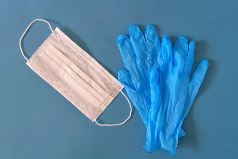 medical-mask-gloves-blue-table